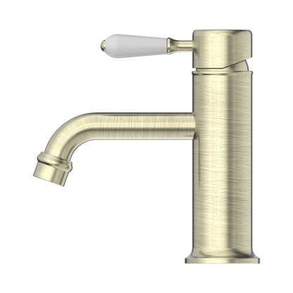 York Straight Basin Mixer With White Porcelain Lever Aged Brass